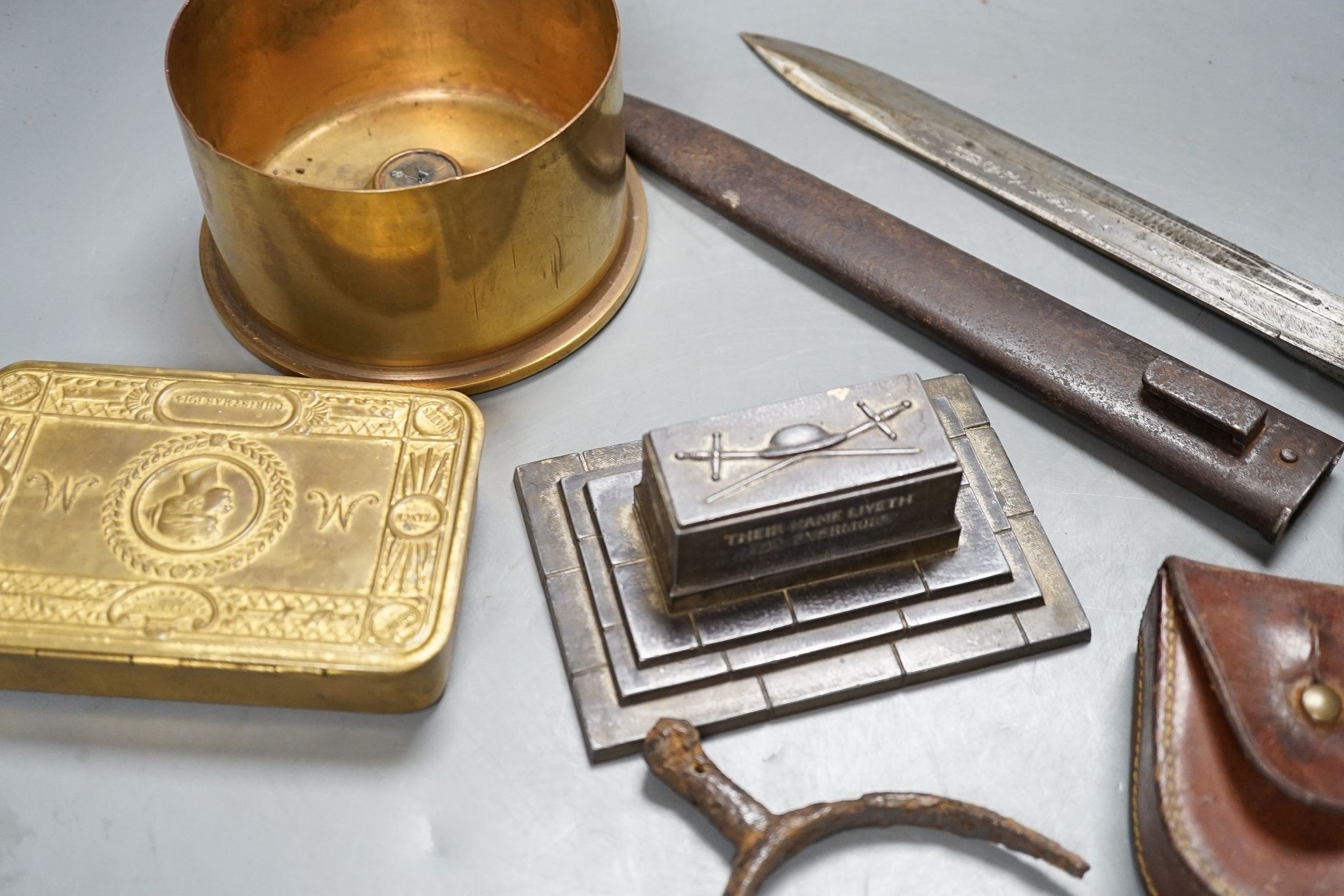 A British WWI Short & Mason compass, two bayonets, cartridge case, Lucas morse code, etc.